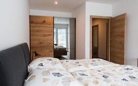 Ferienwohnung Bergsonne mit Sonnenbalkon und Tiefgaragen Parkplatz
